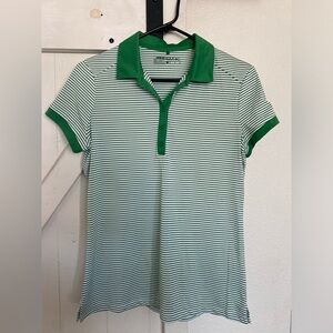 Ladies Nike dri fit golf shirt.